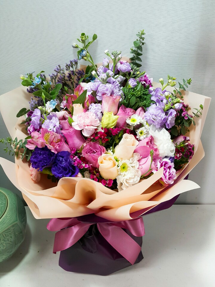 예도화환 리본 문구 출력 및 화환 부착 검수 과정 사진